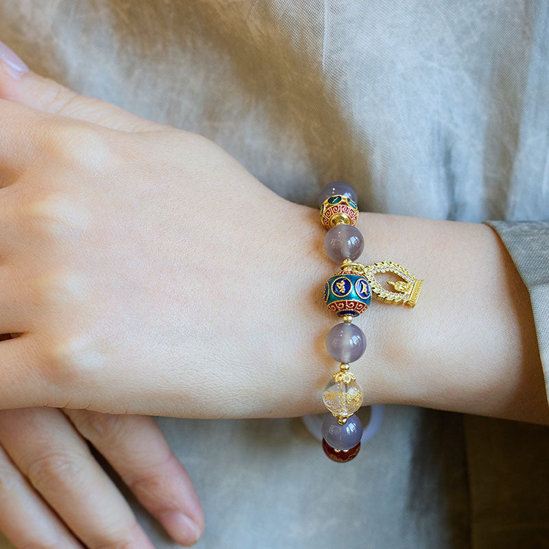 Pulsera de ágata natural morada con Buda