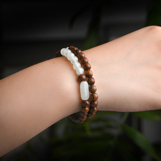 Pulsera de madera de sándalo y jade esmeralda