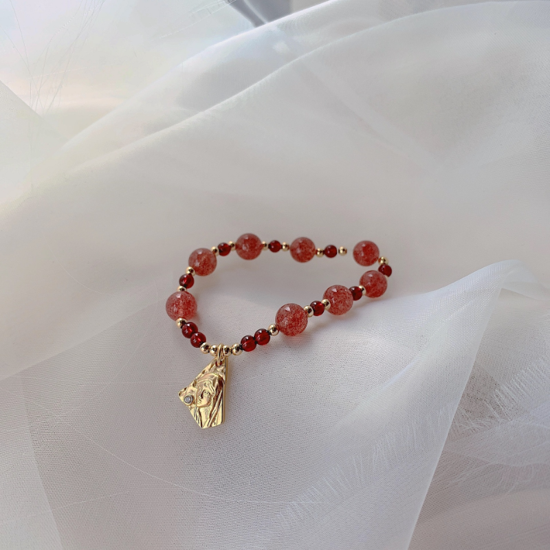 Portrait · Garnet crystal bracelet