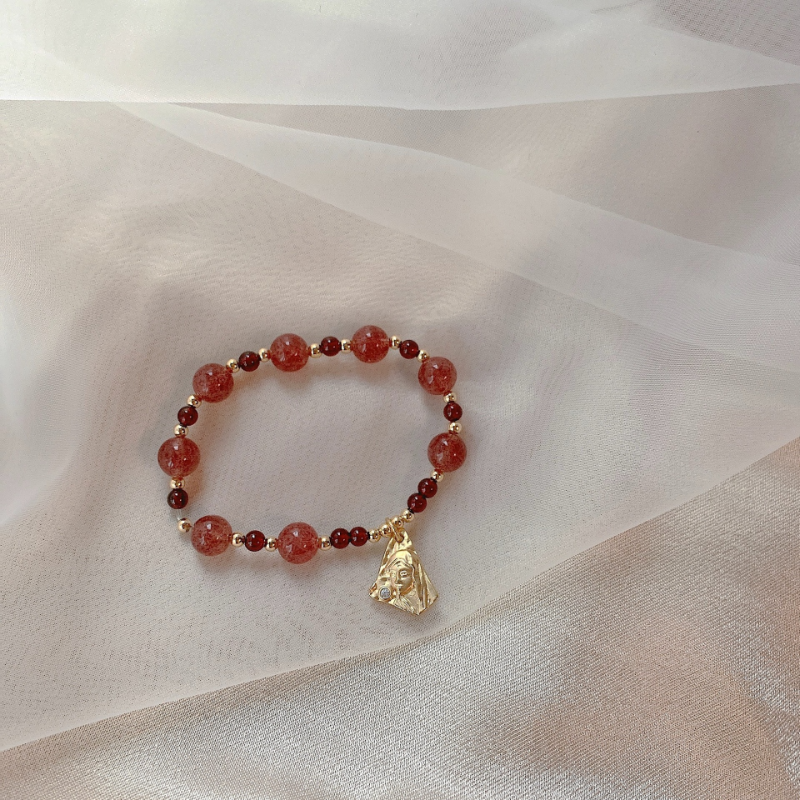 Portrait · Garnet crystal bracelet