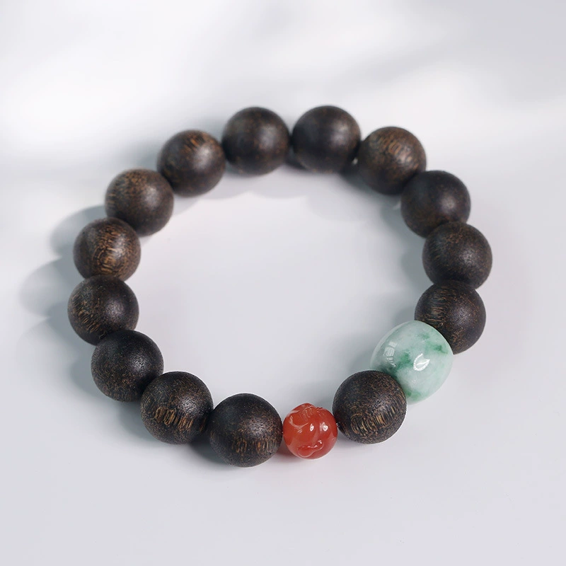 Pulsera de agarwood con mini Buda