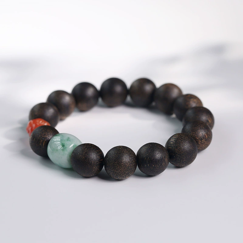 Pulsera de agarwood con mini Buda