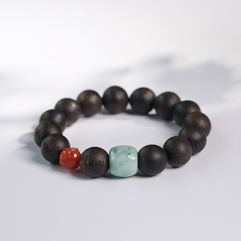 Pulsera de agarwood con mini Buda