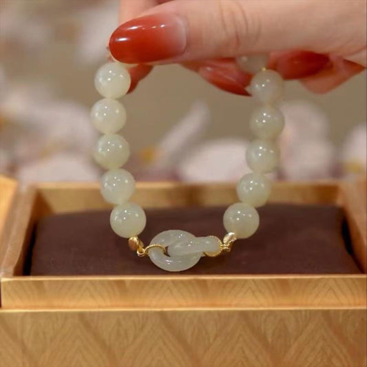 Interlocking circles · Emerald Jade stone bracelet