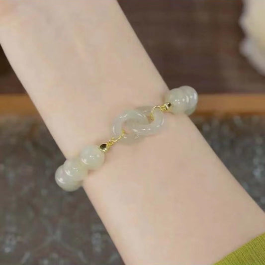 Interlocking circles · Emerald Jade stone bracelet