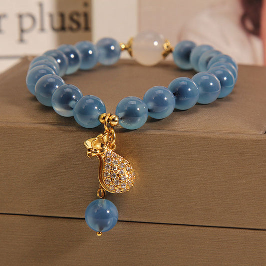 Bolsa de Dinero · Pulsera de Ágata Fuente de Sal Azul