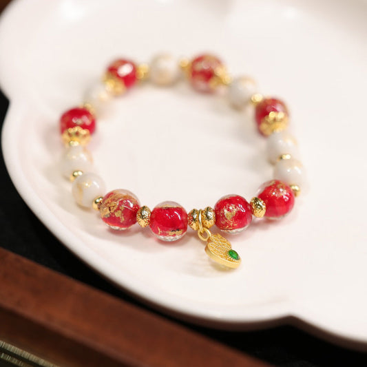 Pulsera de cuentas de vidrio con lámina de oro de calabaza retro