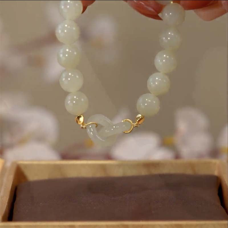 Interlocking circles · Emerald Jade stone bracelet